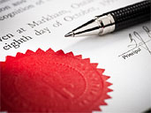 Closeup of seal stamped into paper with stamper